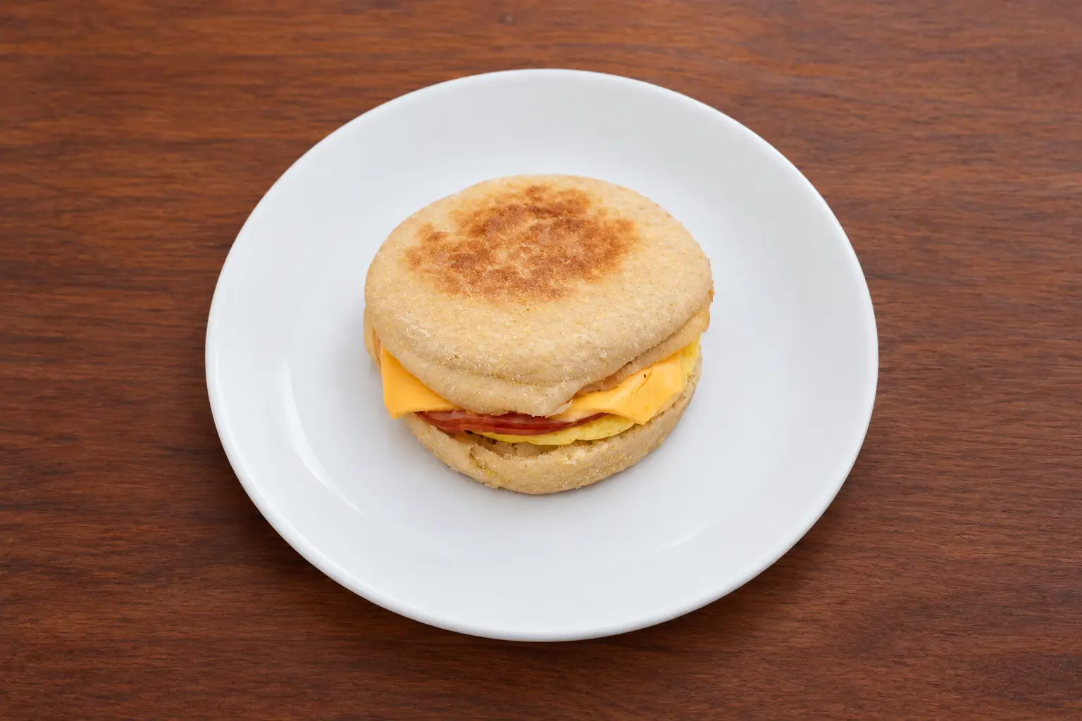 English Muffin with Canadian Bacon, Egg, and American Cheese